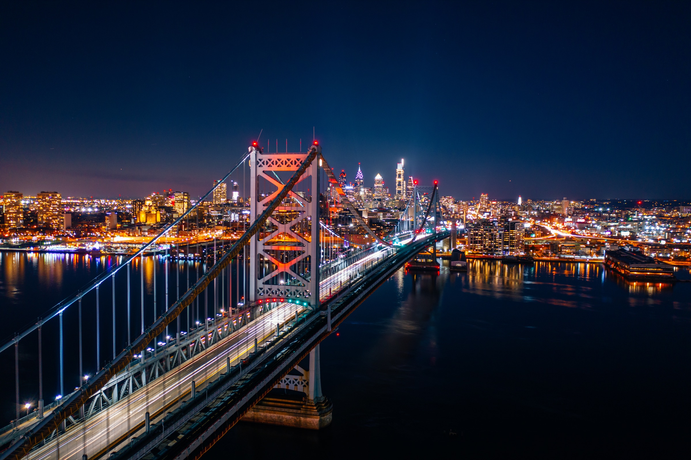 Philadelphia skyline and bridge at night